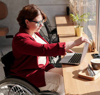 a woman working in a wheelchair